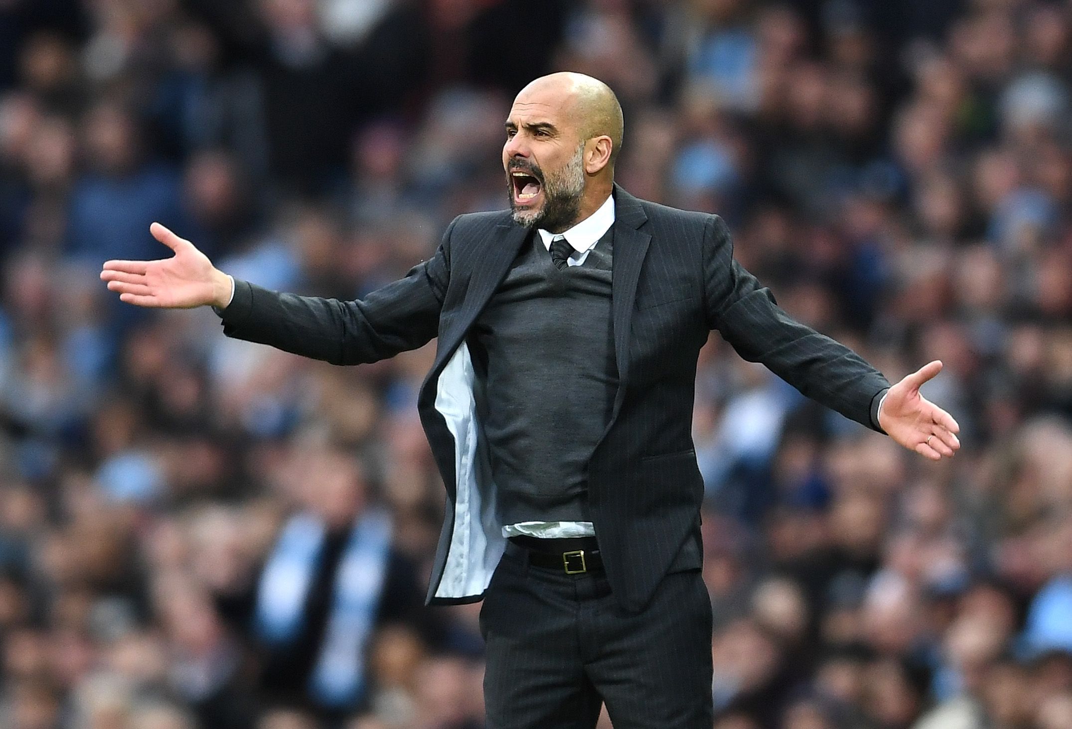  Pep Guardiola, current manager of Manchester City, gestures on the touchline during a match, with the image representing the search query 'Pep Guardiola as England manager'.