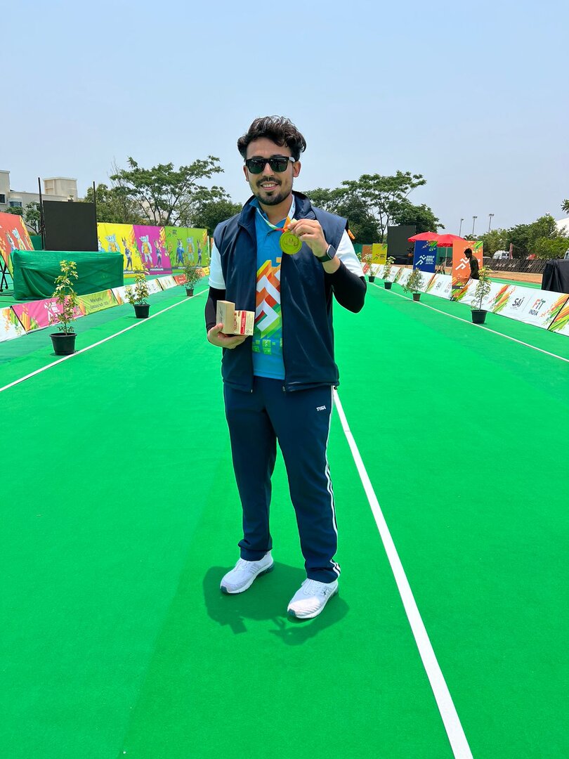 Tanishdeep Singh with his Gold medal in men's compound Archery at Khelo India University Games 2021