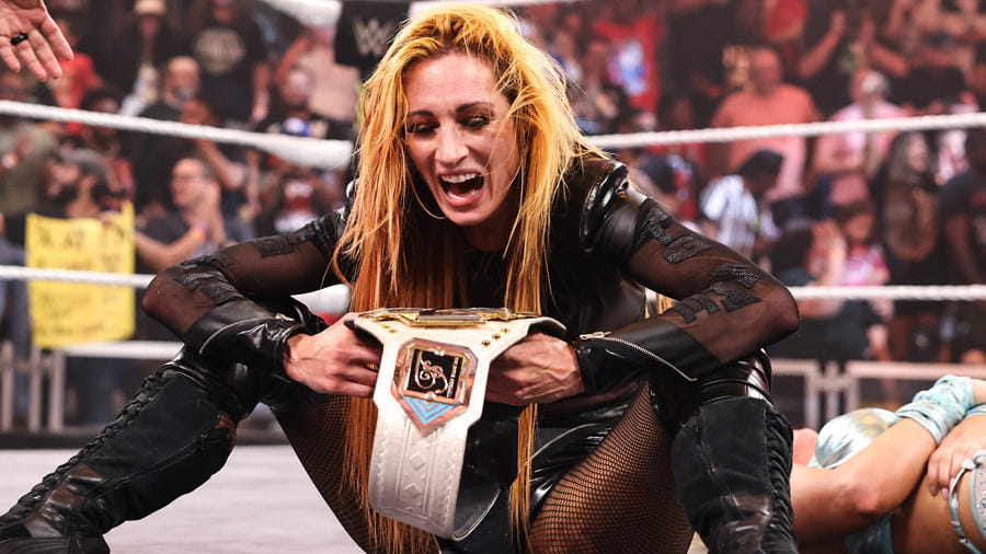 Why did WWE put NXT titles on Becky Lynch & Dominik Mysterio?