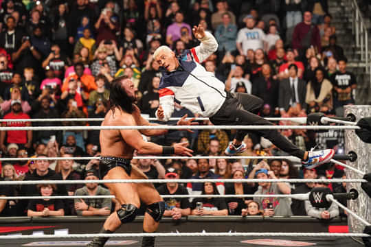 Cody Rhodes delivering a Cody Cutter to Drew McIntyre WWE RAW SmackDown