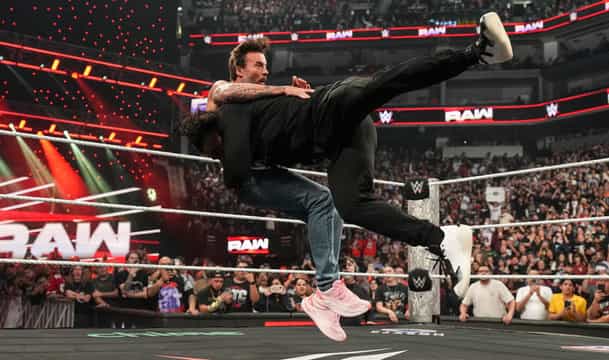 Roman Reigns spears CM Punk WWE RAW