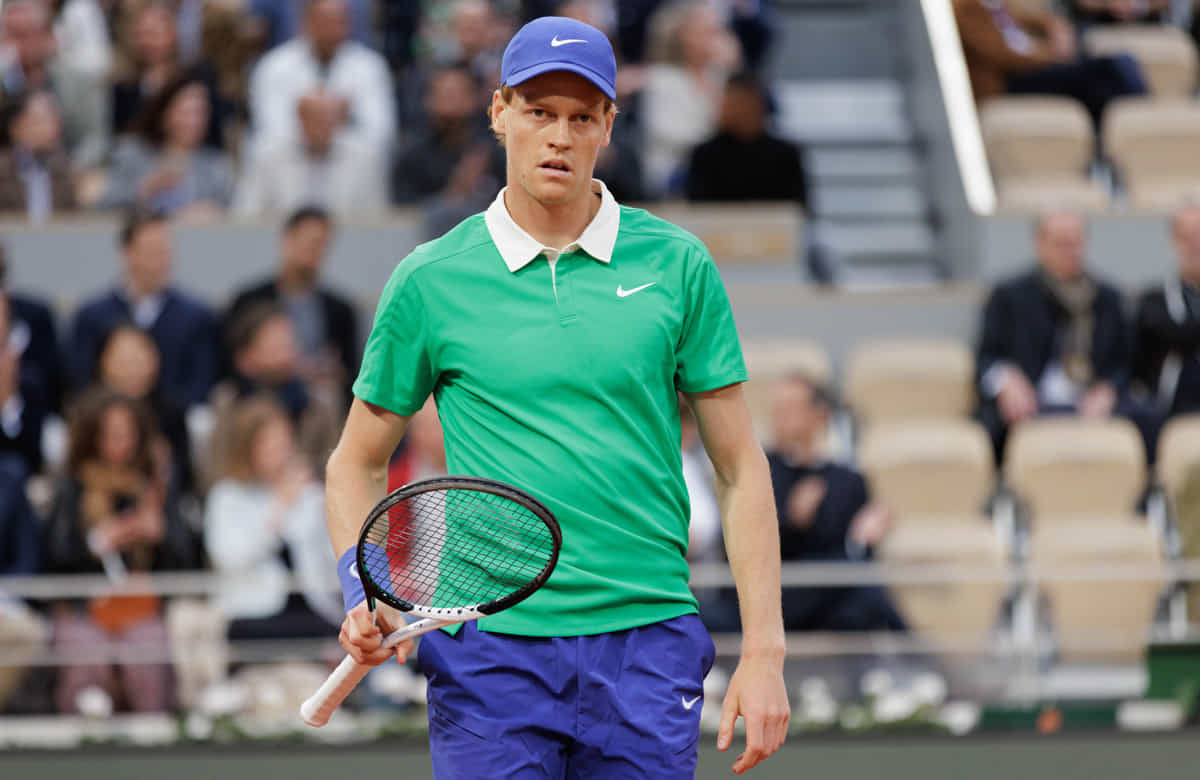 Where does Jannik Sinner's Grand Slam win streak stand in tennis history?