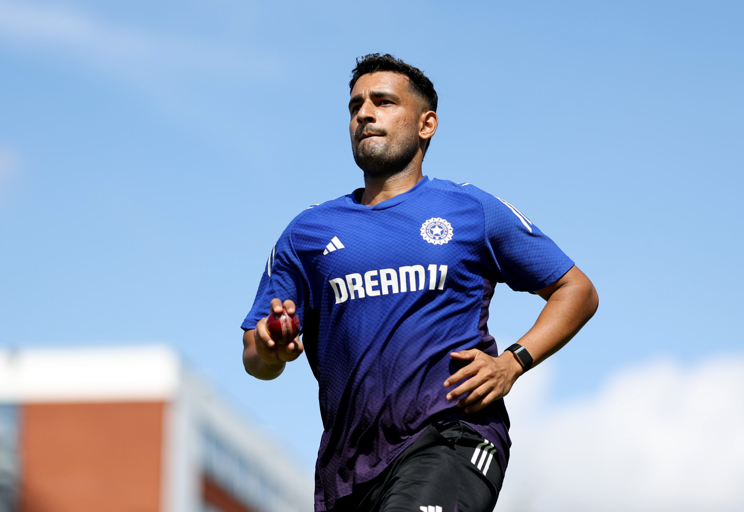 MANCHESTER, ENGLAND - JULY 21: Anshul Kamboj of India bowls during a India Session at Emirates Old Trafford on July 21, 2025 in Manchester, England. (Photo by Alex Davidson/Getty Images)