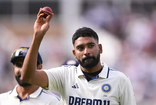 BIRMINGHAM, ENGLAND - JULY 04: Mohammed Siraj of India holds the match ball after taking six wickets in the innings during the day three of the 2nd Rothesay Test Match at Edgbaston on July 04, 2025 in Birmingham, England. (Photo by Stu Forster/Getty Images)