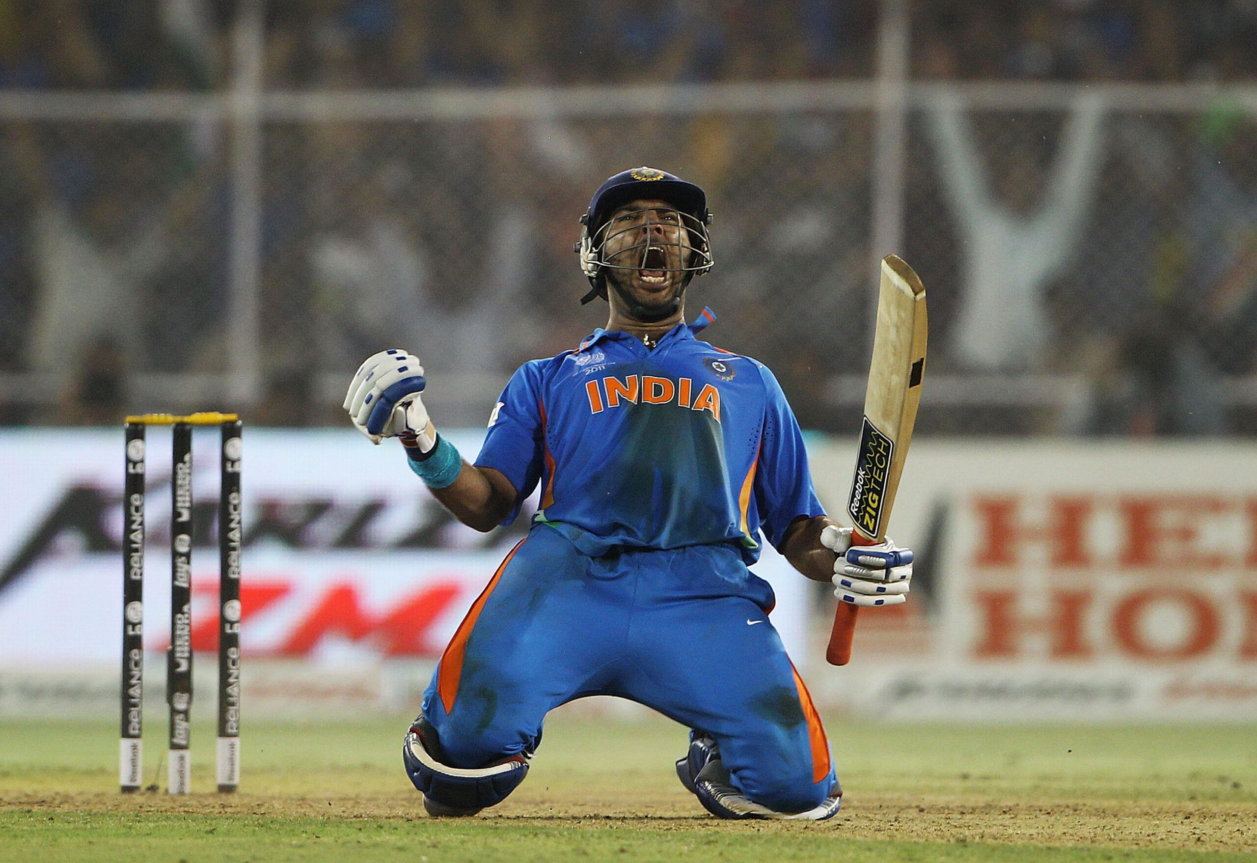 AHMEDABAD, INDIA - MARCH 24: Yuvraj Singh of India celebrates hitting the winning runs during the 2011 ICC World Cup Quarter Final match between Australia and India at Sardar Patel Stadium on March 24, 2011 in Ahmedabad, India. (Photo by Matthew Lewis/Getty Images)