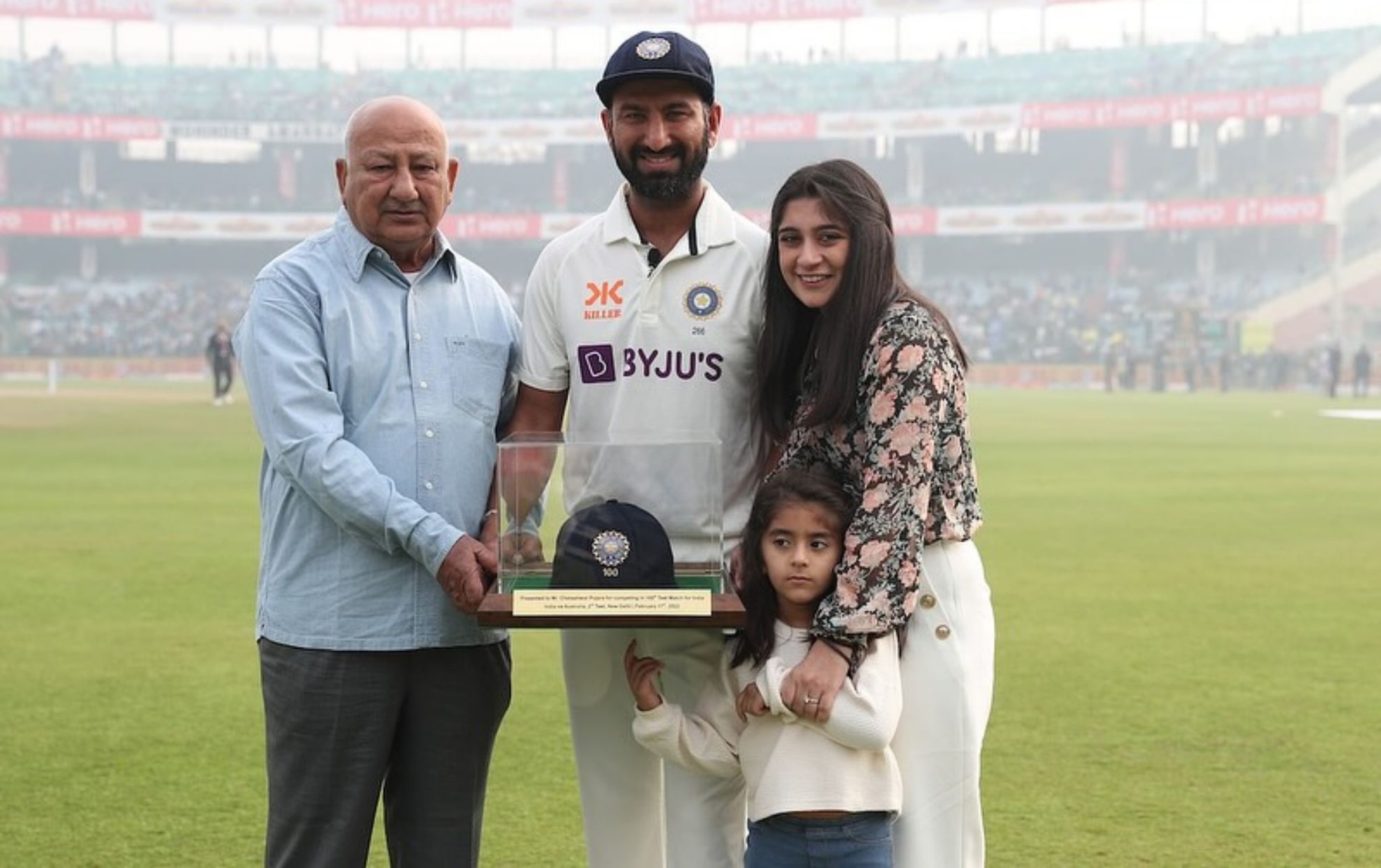 Cheteshwar Pujara with his father, wife and daughter