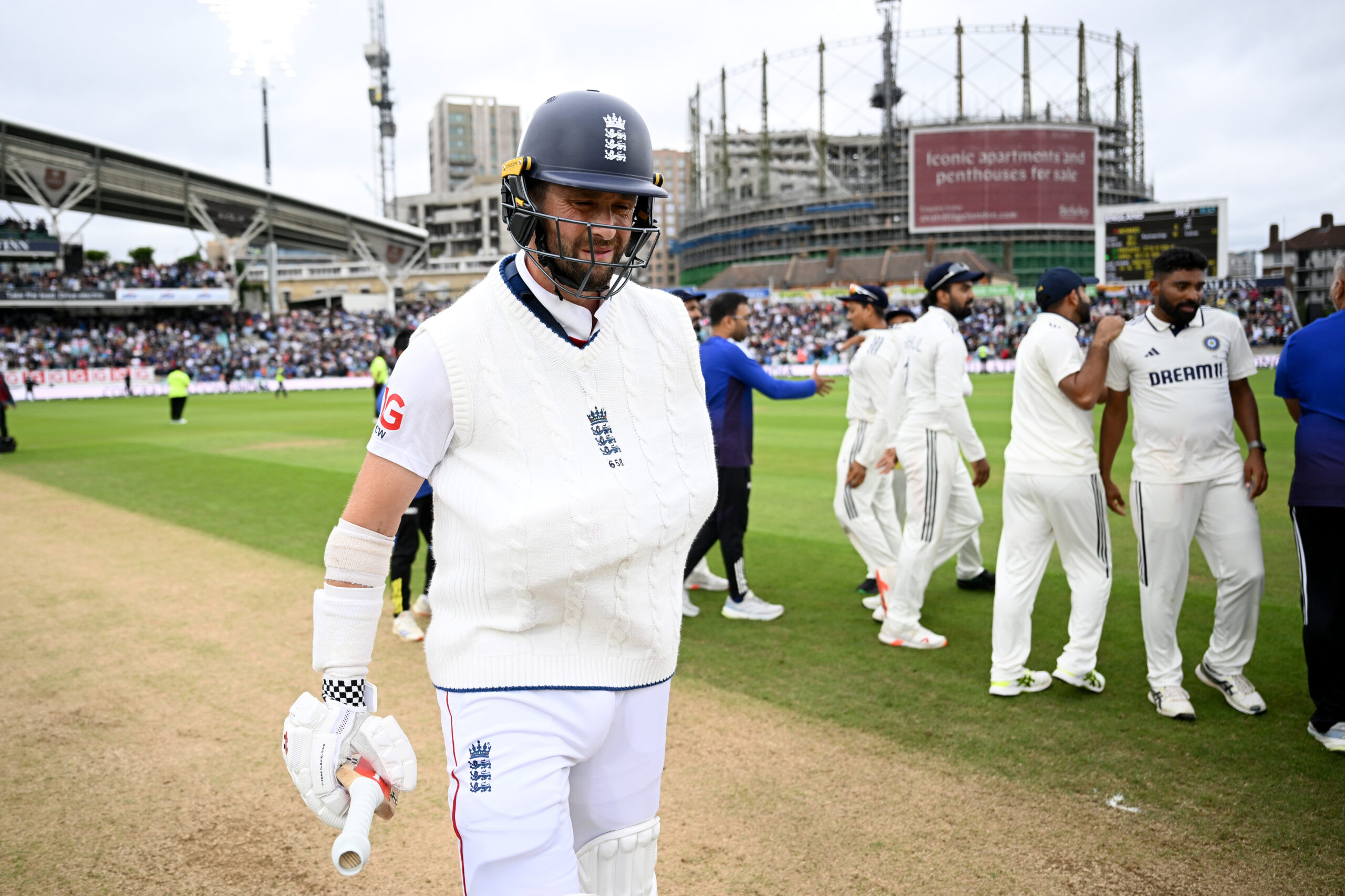 LONDON, ENGLAND - AUGUST 04: Chris Woakes of England walks off the field at the end of the match after batting with his arm in a sling on day five of the 5th Rothesay Test Match at The Kia Oval on August 04, 2025 in London, England. (Photo by Gareth Copley/Getty Images)