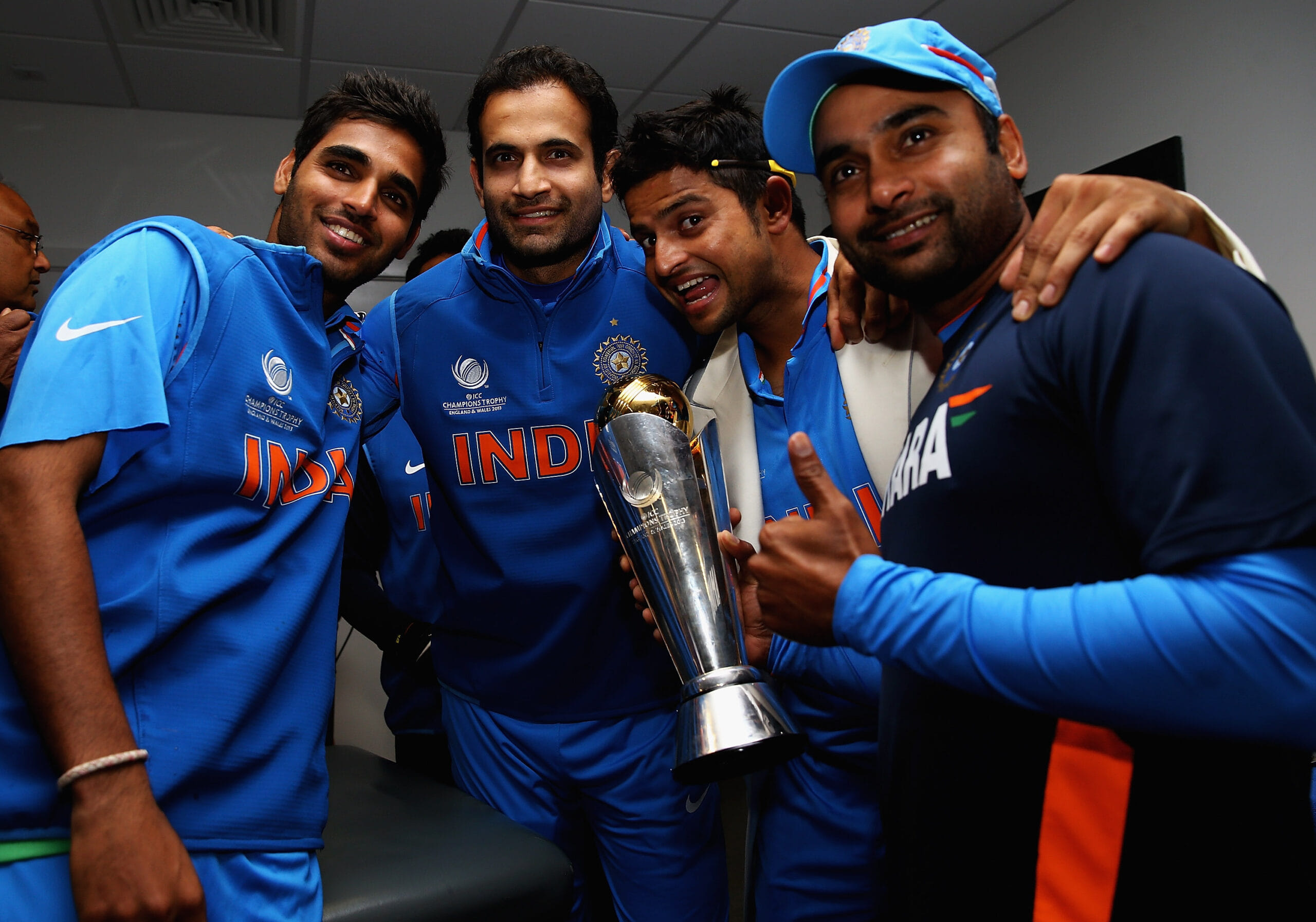 Amit Mishra, Suresh Raina, Irfan Pathan and Bhuvneshwar Kumar pose with the ICC Champions Trophy