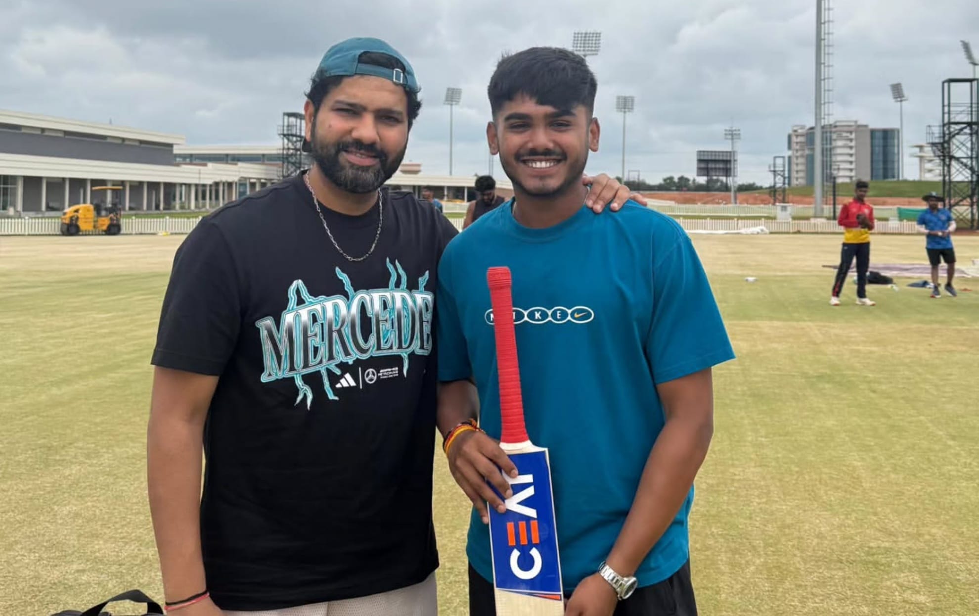 Rohit Sharma gifts bat to Ayush Mhatre