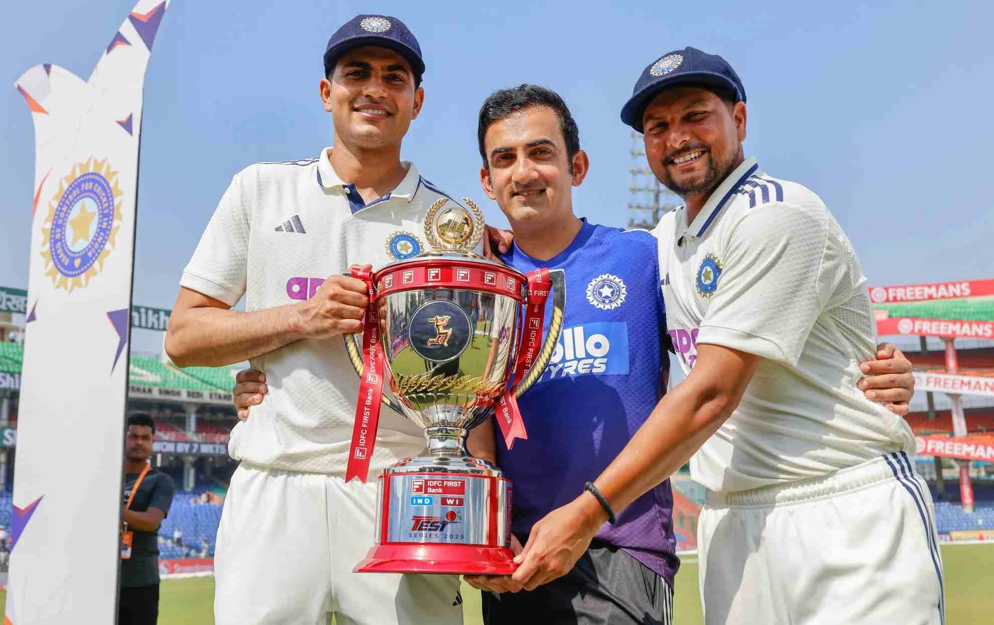 Gautam Gambhir, Shubman Gill and Kuldeep Yadav pose with the test series trophy