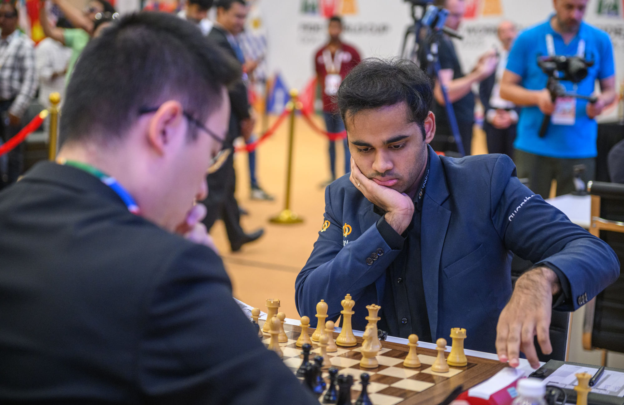 FIDE World Cup 2025: Arjun Erigaisi’s Quarterfinal clash against Wei Yi heads to a tiebreak after draw in game 2 Having played a quick draw with black on Monday, Arjun expectedly looked for a win with white and it looked like the highest ranked player left in the competition had gained an upper hand in the middle game. At that stage, the chess engines were suggesting a bishop sacrifice as the top move to drive home the advantage but Arjun went with a relatively steady queen to d2 and Wei then defended well to ensure that there was no other result possible. Arjun will begin the tiebreak with black pieces on Wednesday and should be the favourite to advance in the rapid format. Two more quarterfinals will head to the tiebreak as GM GM Andrey Esipenko split the point against GM Sam Shankland after 37 moves while the match between GM Jose Eduardo Martinez Alcantara and GM Javokhir Sindarov ended after just 25 moves with the game lasting just 18 minutes. Uzbekistan's GM Nodirbek Yakubboev was the only player to advance to the semi-finals after the two classical games as he drew the second game against GM Alexander Donchenko of Germany in 57 moves. Nordirbek had won the first game with white pieces. Results: GM Andrey Esipenko drew with GM Sam Shankland (1:1 aggregate) GM Jose Eduardo Martinez Alcantara vs GM Javokhir Sindarov (1:1 aggregate) GM Arjun Erigaisi drew with GM Wei Yi (1:1 aggregate) GM Alexander Donchenko lost to GM Nodirbek Yakubboev (0.5:1.5 aggregate) What was the result of the second classical game between GM Arjun Erigaisi and GM Wei Yi?The second game ended in a draw, sending their FIDE World Cup 2025 quarterfinal match to a tiebreak.Why couldn’t Arjun convert his advantage in the middle game?Although Arjun had a promising position, he missed the engine-recommended bishop sacrifice and chose a safer move (Qd2), allowing Wei Yi to defend accurately.When will the tiebreak between Arjun Erigaisi and Wei Yi take place?The tiebreak will be played on Wednesday, with Arjun starting with the black pieces.Which quarterfinal match has already demonstrated a semifinalist?Uzbekistan’s GM Nodirbek Yakubboev became the only player to reach the semifinals outright after defeating GM Alexander Donchenko 1.5–0.5.How many quarterfinal matches are heading to tiebreaks?Three matches: Esipenko vs Shankland, Martinez Alcantara vs Sindarov, and Erigaisi vs Wei Yi are heading to tiebreaks.