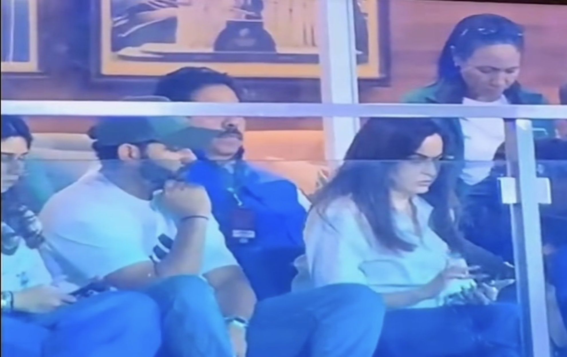 Rohit Sharma peeking into Nita Ambani's phone