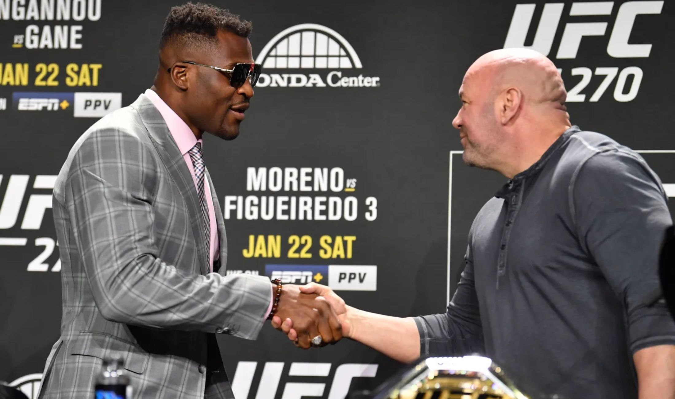 Francis Ngannou of Cameroon shakes hands with UFC president Dana White