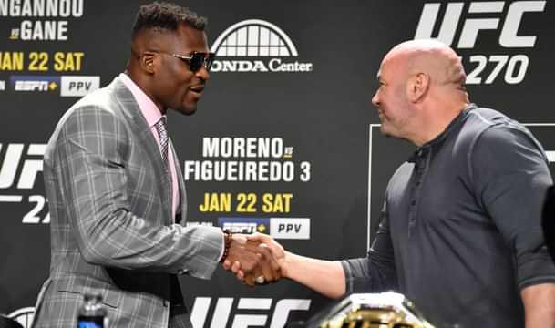 Francis Ngannou of Cameroon shakes hands with UFC president Dana White
