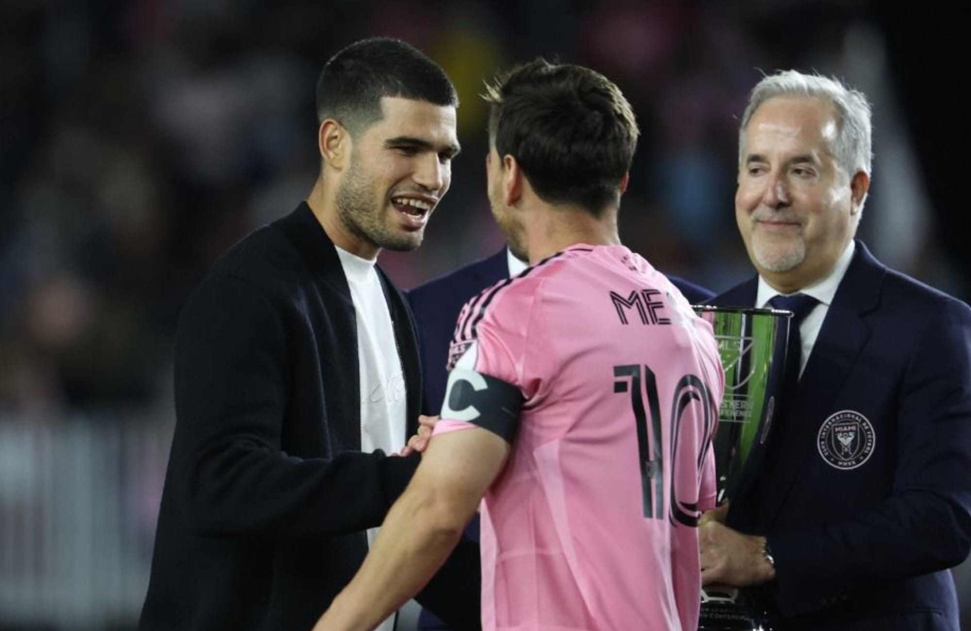 Carlos Alcaraz hands Lionel Messi trophy after Inter Miami’s Eastern Conference win