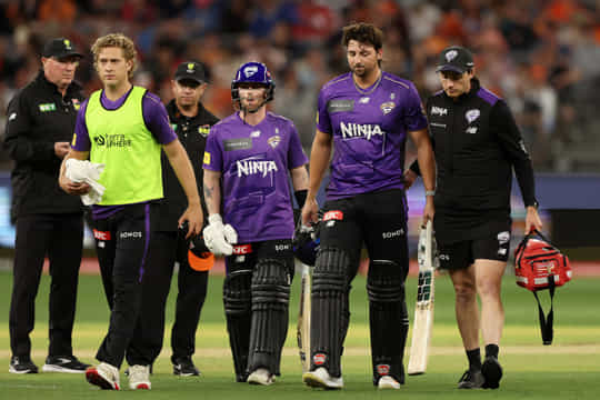 PERTH, AUSTRALIA - DECEMBER 26: Tim David of the Hurricanes leaves the field injured during the BBL match between Perth Scorchers and Hobart Hurricanes at Optus Stadium, on December 26, 2025, in Perth, Australia (Photo by Janelle St Pierre/Getty Images)