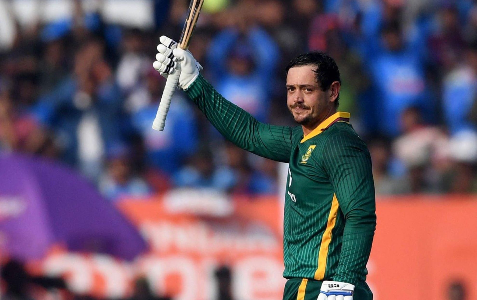 Quinton de Kock celebrates his 100 against India in Visakhapatnam