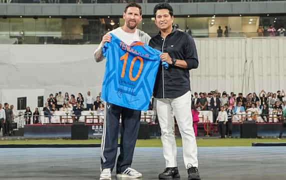 GOD of cricket Sachin Tendulkar gifts his signed jersey to Lionel Messi.
