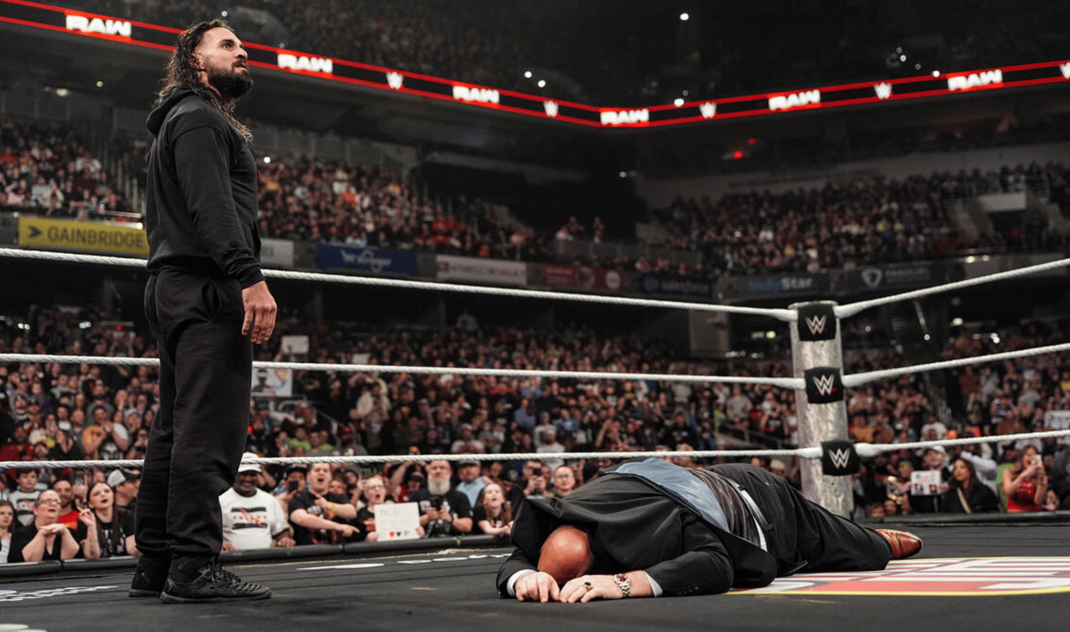 WWE Raw Seth Rollins attacks Paul Heyman
