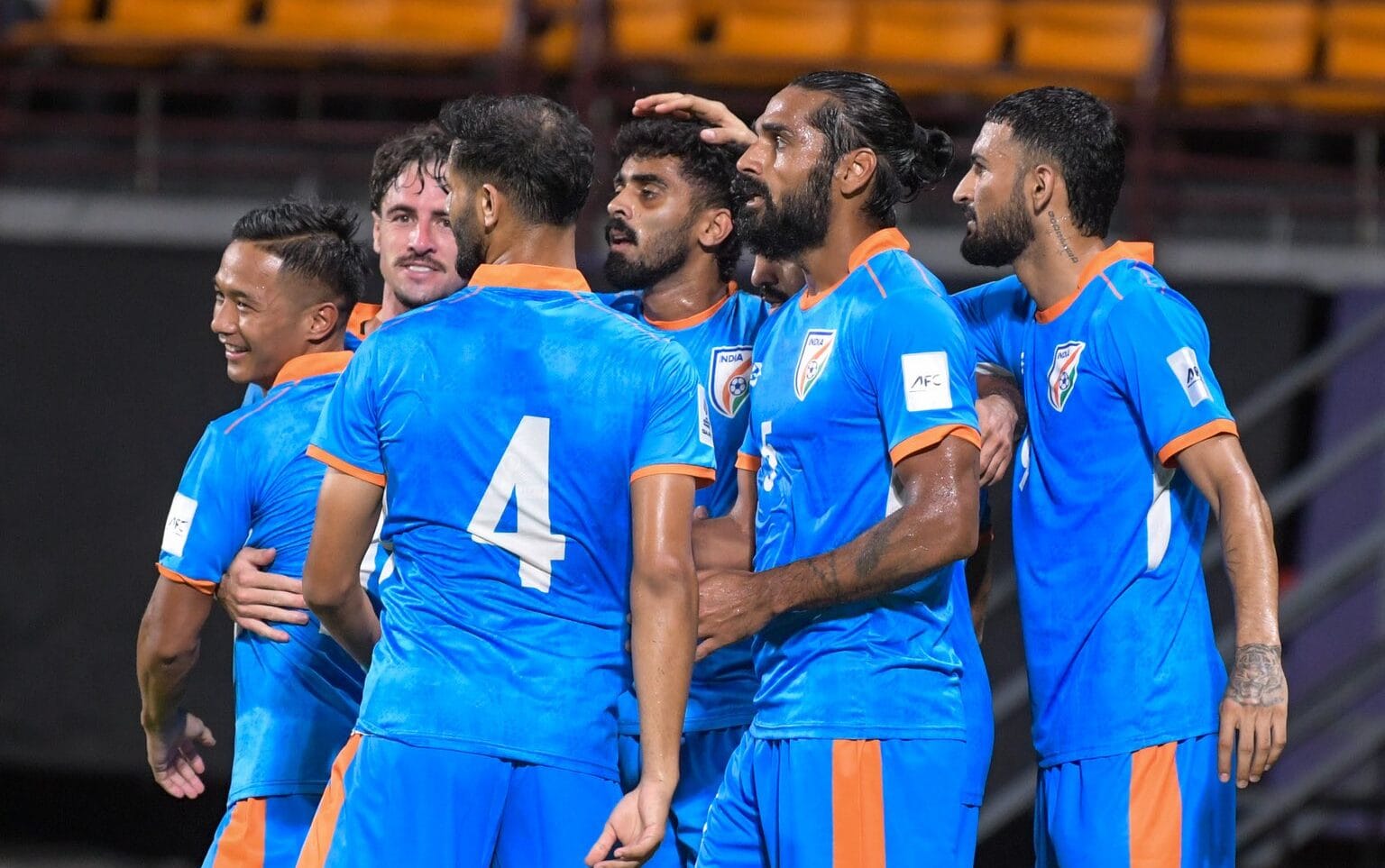 Indian national team players celebrating Akash Mishra's goal against Hong Kong