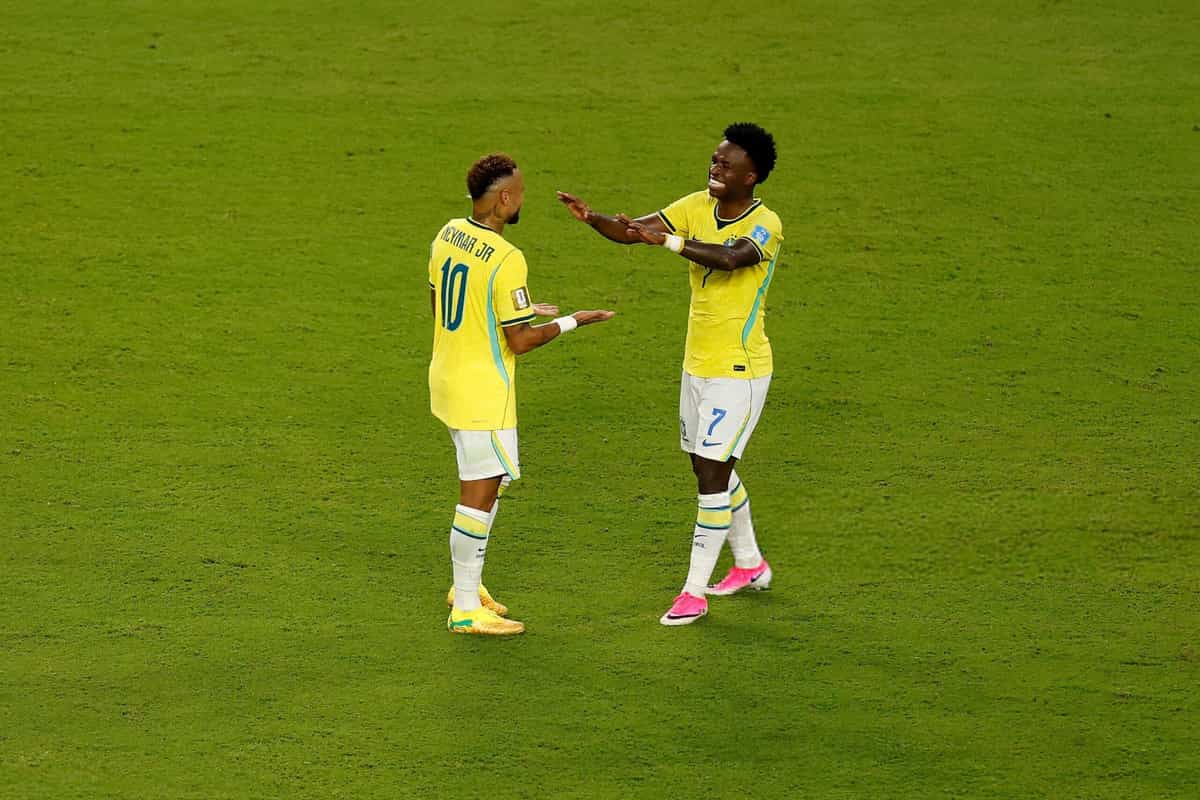 MIAMI GARDENS, FLORIDA - JUNE 24: Neymar Jr #10 and Vinicius Junior #7 of Brazil celebrate after the 3-0 win during the FIFA World Cup 2026 Group C match between Scotland and Brazil at Miami Stadium on June 24, 2026 in Miami Gardens, Florida. (Photo by Michael Reaves/Getty Images)