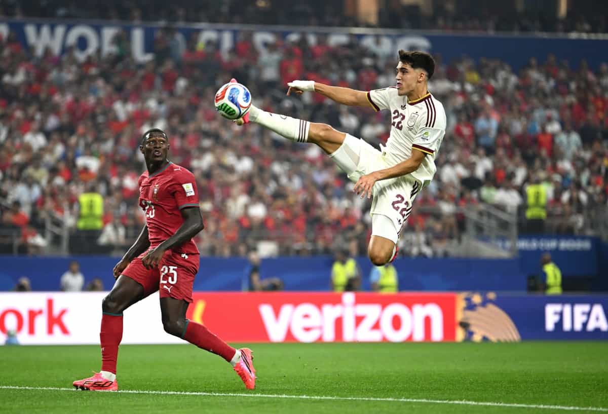 ARLINGTON, TEXAS - JULY 06: Pau Cubarsi #22 of Spain controls the ball against Nuno Mendes #25 of Portugal during the FIFA World Cup 2026 Round of 16 match between Portugal and Spain at Dallas Stadium on July 06, 2026 in Arlington, Texas. (Photo by Hannah Peters - FIFA/FIFA via Getty Images)