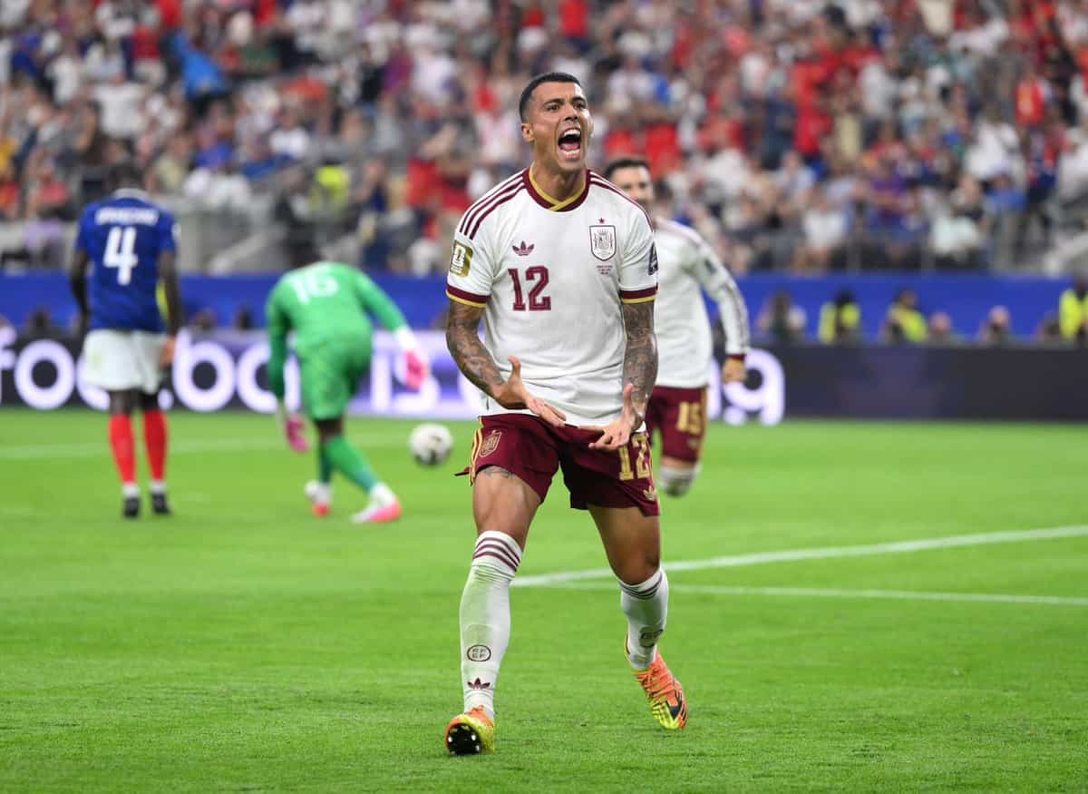 ARLINGTON, TEXAS - JULY 14: Pedro Porro #12 of Spain celebrates scoring his team's second goal during the FIFA World Cup 2026 Semi Final match between France and Spain at Dallas Stadium on July 14, 2026 in Arlington, Texas. (Photo by David Ramos/Getty Images)