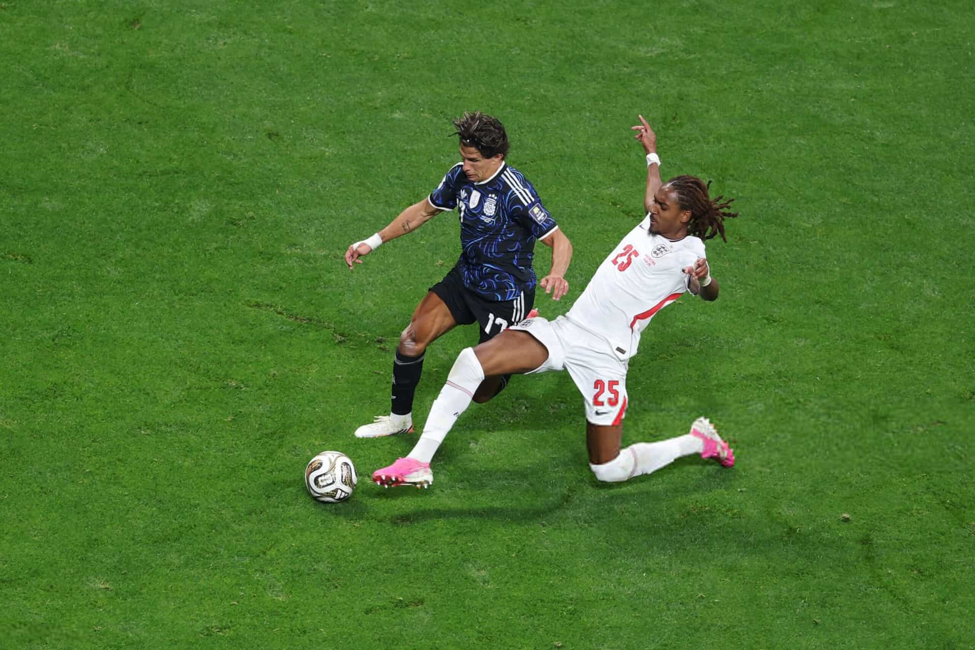 ATLANTA, GEORGIA - JULY 15: Djed Spence #25 of England makes a stop against Giuliano Simeone #17 of Argentina during the FIFA World Cup 2026 Semi Final match between England and Argentina at Atlanta Stadium on July 15, 2026 in Atlanta, Georgia. (Photo by Steph Chambers - FIFA/FIFA via Getty Images)