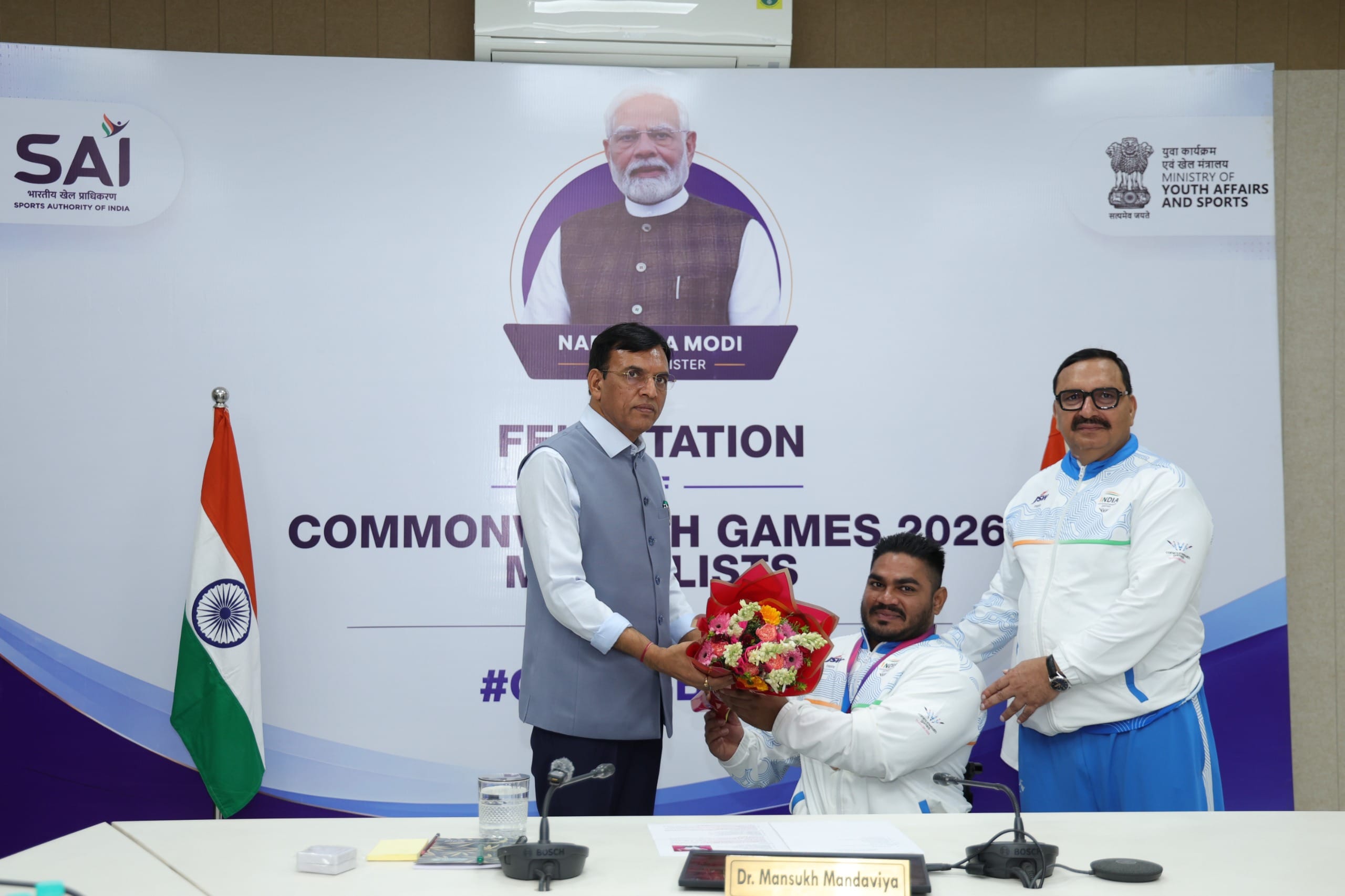 Dr Mansukh Mandaviya felicitates CWG 2026 bronze medal-winning powerlifter Jhandu Kumar