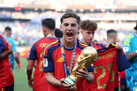 EAST RUTHERFORD, NEW JERSEY - JULY 19: Gavi #9 of Spain celebrates with the FIFA World Cup Winner's Trophy after the team’s victory following the FIFA World Cup 2026 Final match between Spain and Argentina at New York New Jersey Stadium on July 19, 2026 in East Rutherford, New Jersey. (Photo by Alex Pantling - FIFA/FIFA via Getty Images)