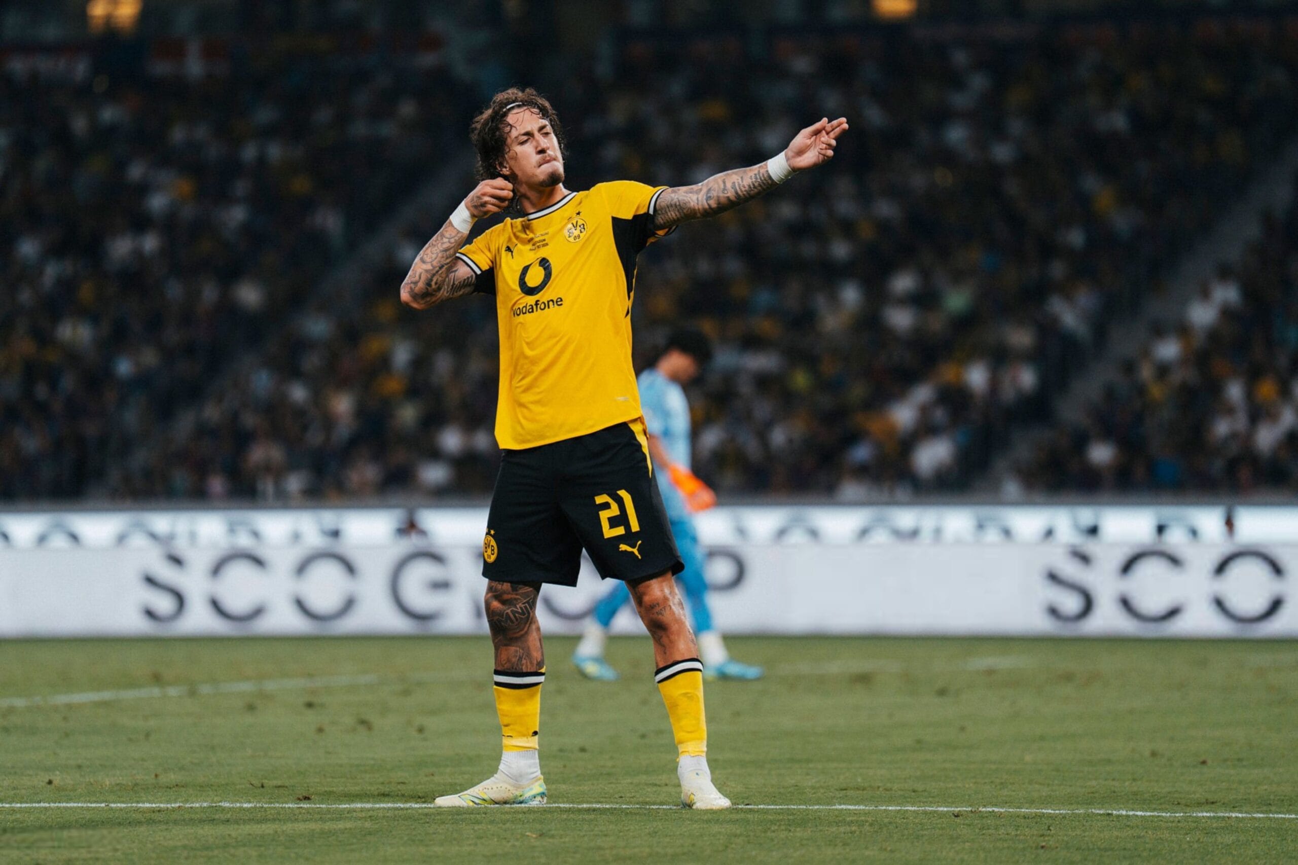 Why was FC Tokyo vs Borussia Dortmund pre-season friendly temporarily suspended?
