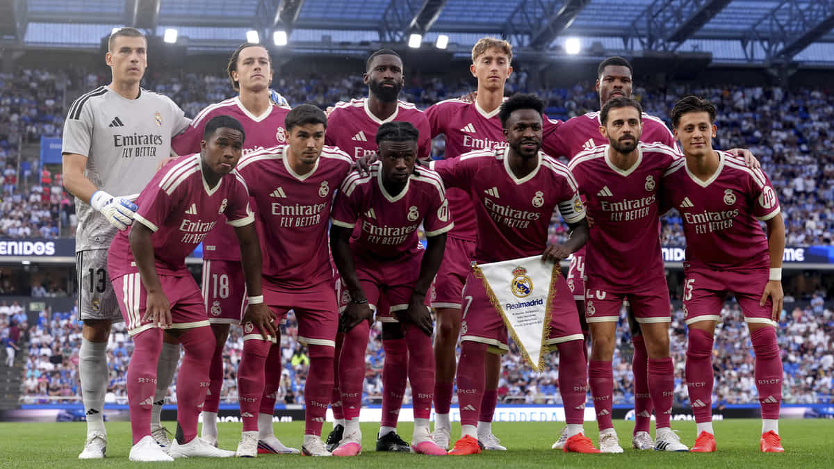 A CORUNA, SPAIN - AUGUST 12: The Real Madrid team line up for a photo prior to kick off during the Trofeo Teresa Herrera match between RC Deportivo A Coruna and Real Madrid at Riazor Stadium on August 12, 2026 in A Coruna, Spain. (Photo by Manuel Queimadelos/Quality Sport Images/Getty Images)
