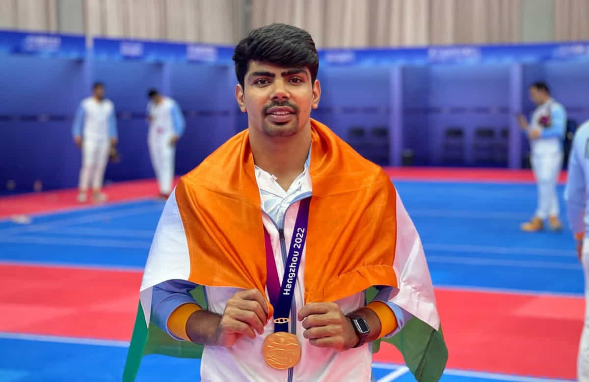 Why Pawan Sehrawat replaced Tajinderpal Singh Toor as India's flag-bearer for Asian Games 2026 opening ceremony?